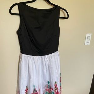 Black dress with embroidered bottom